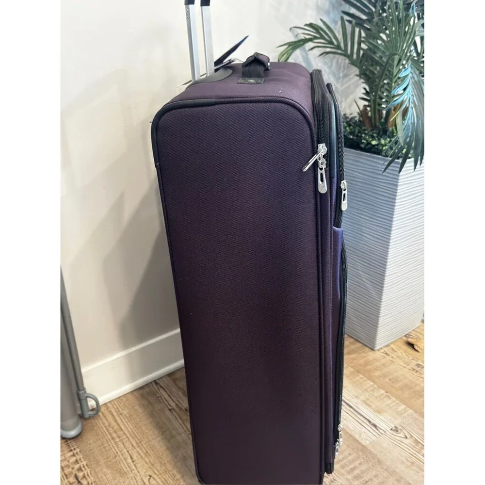 Skyway Epic Large Check-in Spinner Softside purple Suitcase luggage